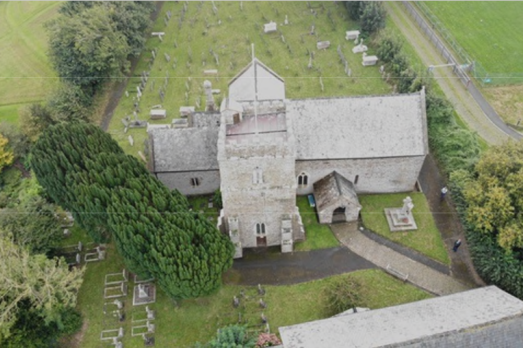 An aerial photograph of Abbotsham St Helen Church