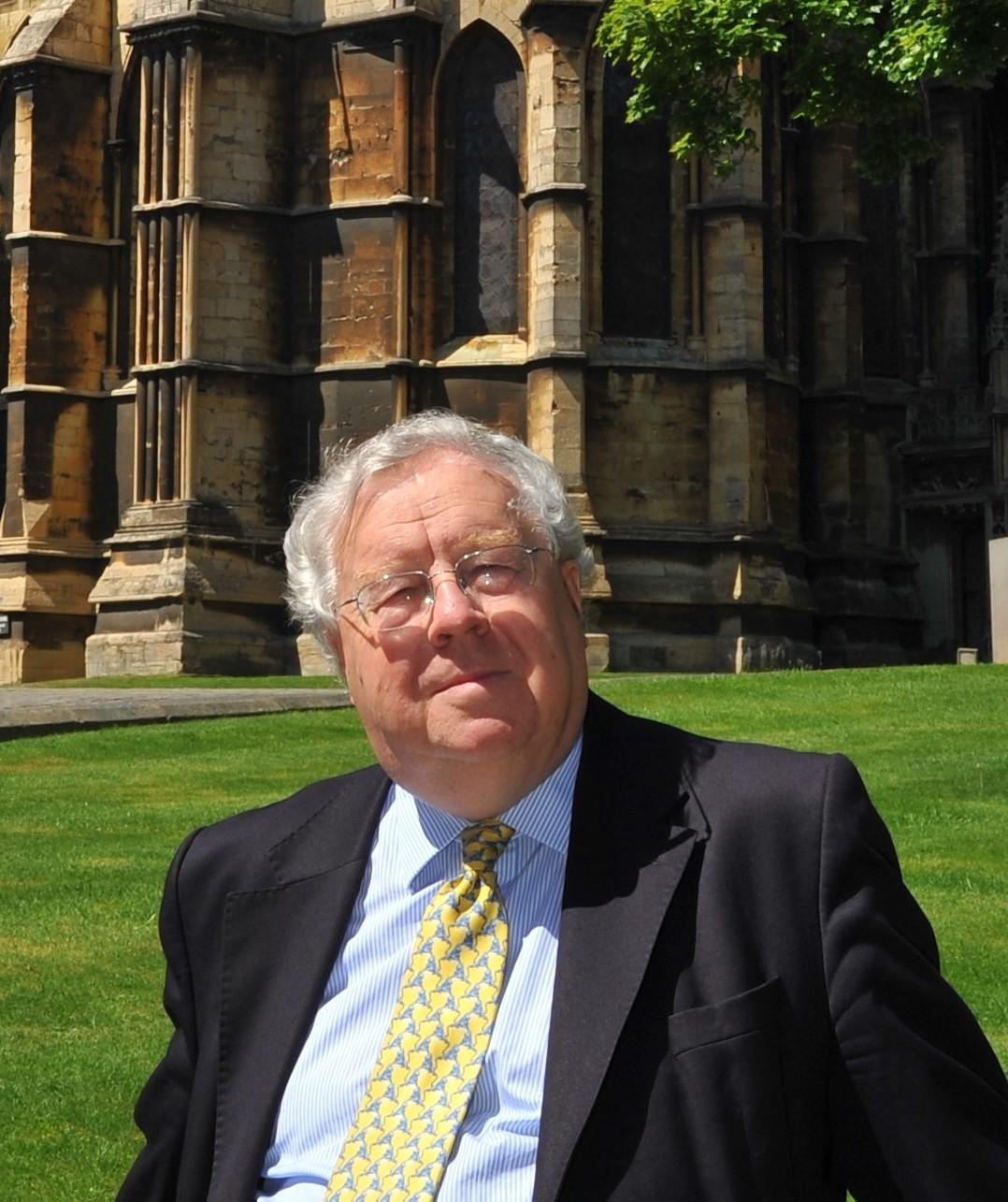 Lord Cormack, pictured in front of a historic building
