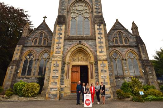 Strabane Church of the Immaculate Conception with the team and the National Churches Trust staff stood outside of the impressive church building.