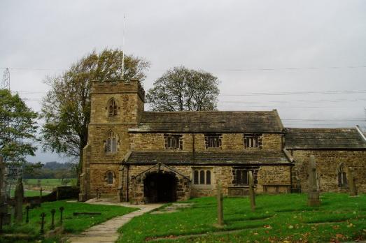Altham St James Church with trees behind