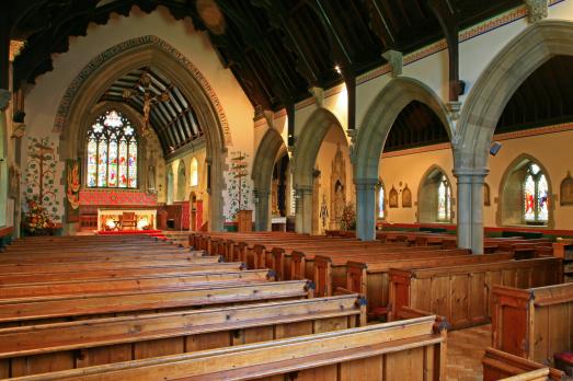 Wooden pews inside a church