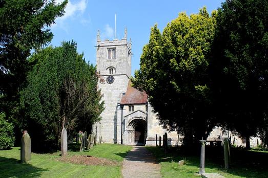A church behind some trees