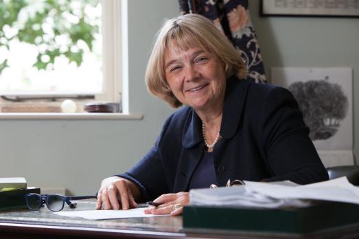 A woman sat at a desk