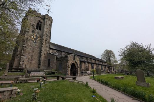 A dark grey church