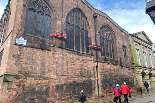 Exterior of St Peter; it backs onto a busy footpath.