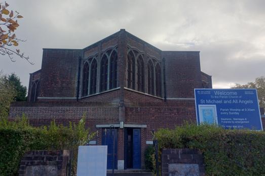 A wide shot of a church