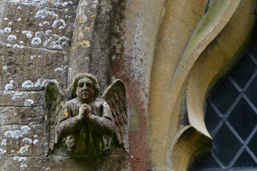 A stone angel on the outside the church