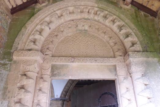 An old carved stone doorway at St Michael