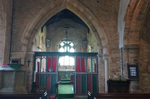The interior of St Michael; showing a beautiful stone archway