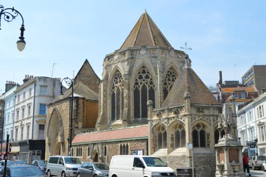 An usual shaped church, ending on a point where two parallel roads meet