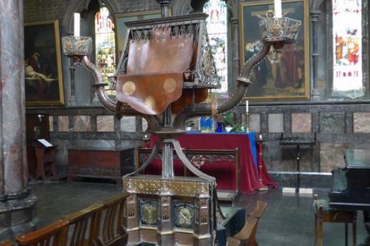 The interior - including the pulpit - of St Cuthbert's in Earls Court