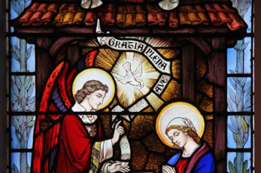 A colourful stained glass winodw at Our Lady of Loreto and Winefride 