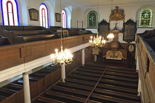 Taken from an upper gallery, you can see the altar and pews in St George's Lutheran Church