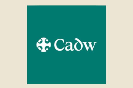 The logo of Cadw
