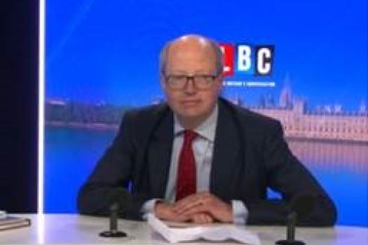 A screenshot of Sir Philip Rutnam being interviewed on LBC Radio
