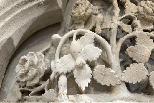 church stonework in the shape of a flower and leaf