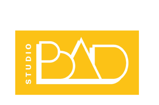 Yellow background with white writing that reads ''Studio BAD''