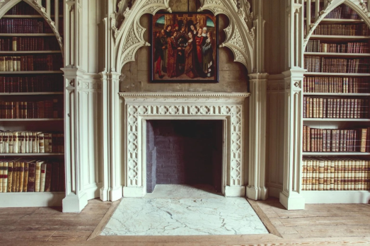 Fireplace with bookshelves either side