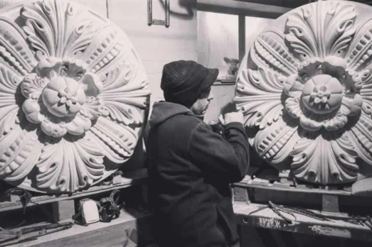 Man carving stone