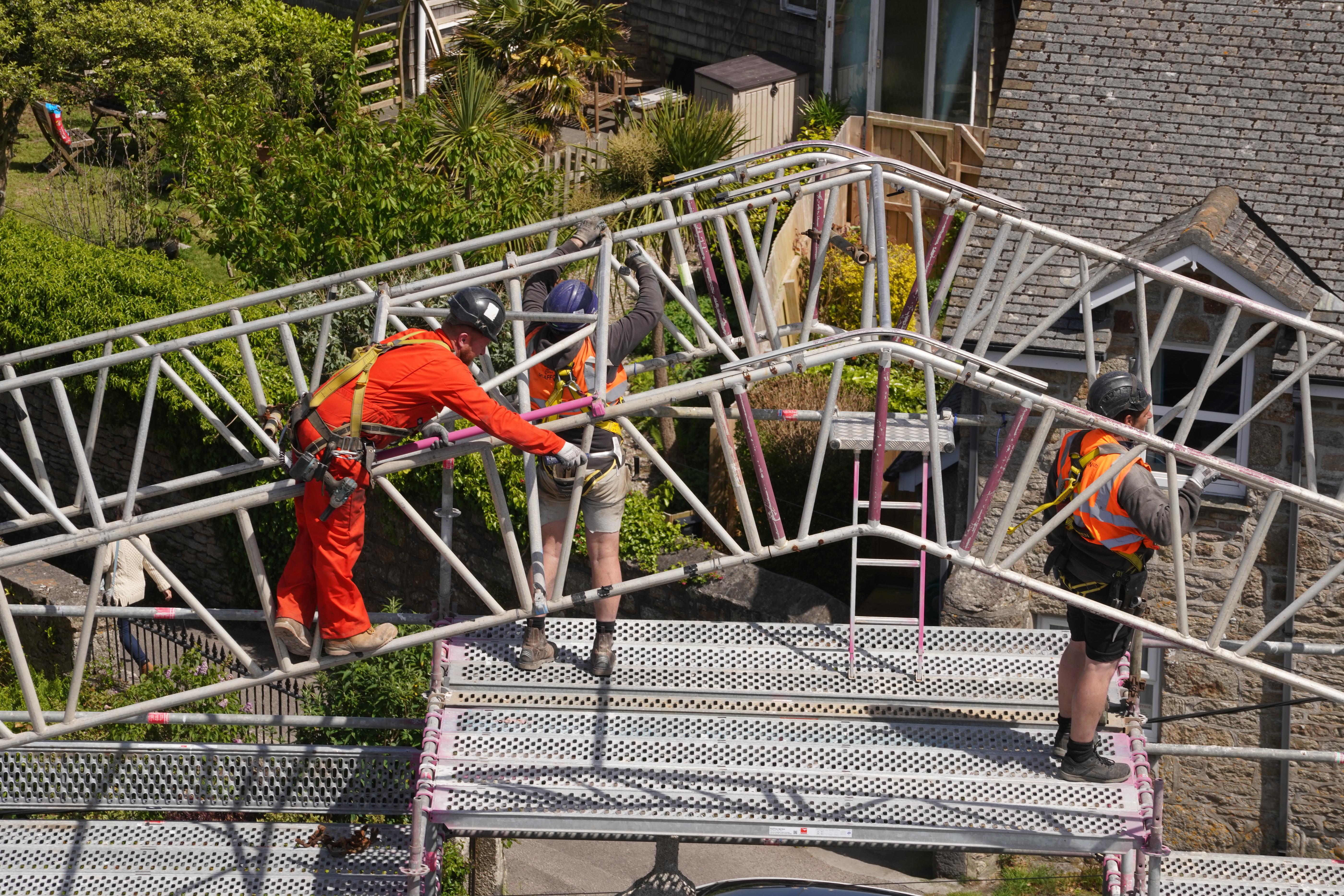 St Just in Penwith church with men on scaffold