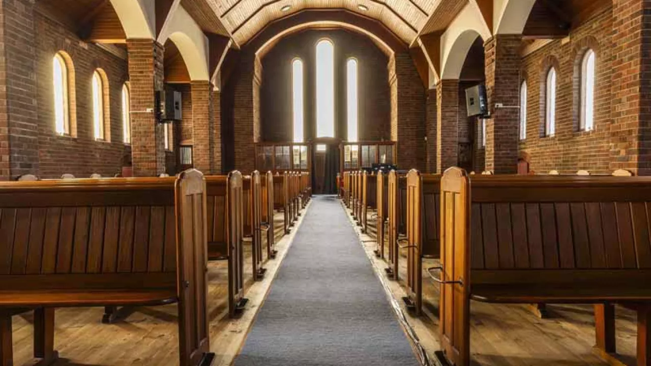An interior photograph of the aisle inside RCCG Church, Edinburgh