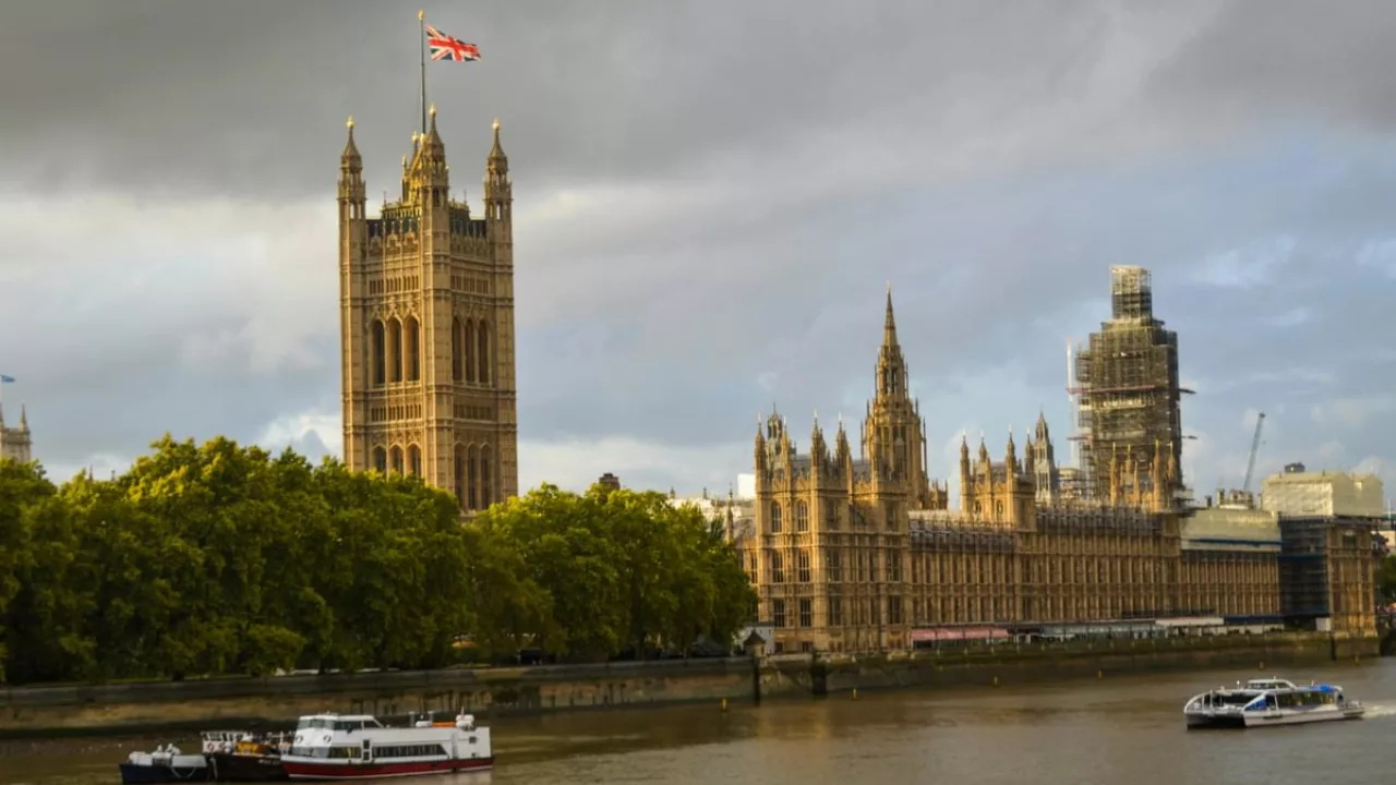 A photograph of the Houses of Parliament, taken from the River Thames