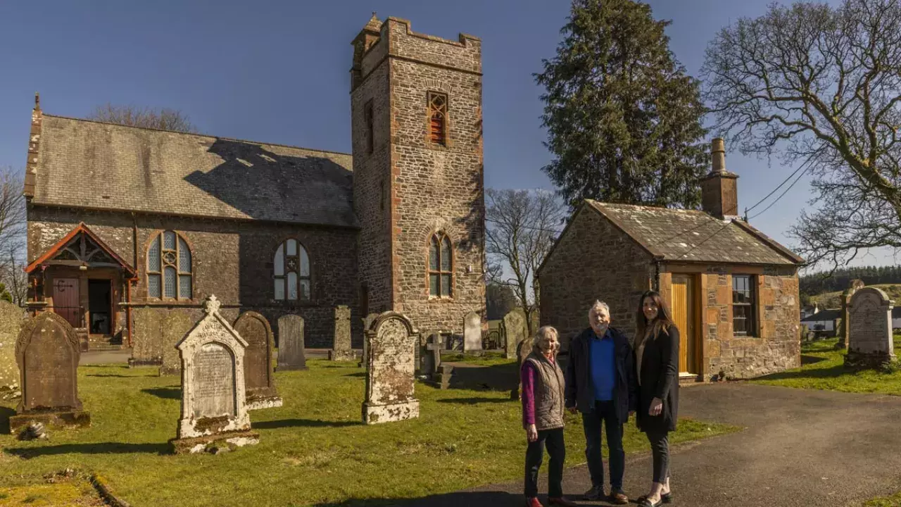 Trustees from The Tundergarth Kirk Trust outside of Tundergarth Church and Remembrance Room