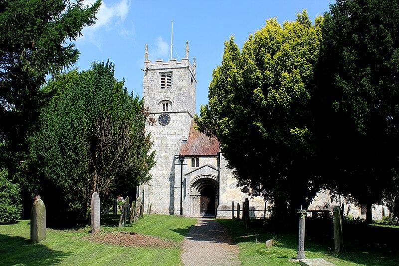 A church behind some trees