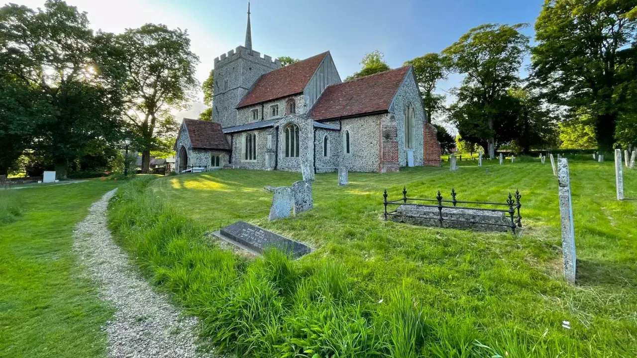 The exterior of a Normal church, seen from the churchyard.