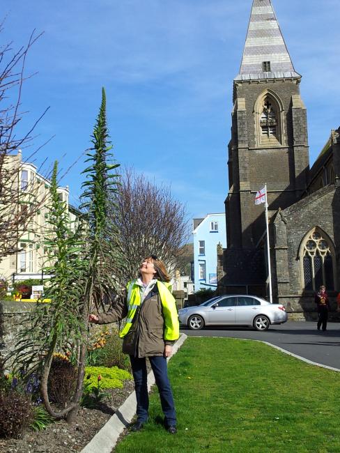 Woman outside of St Philip and St James' church, Ilfracombe