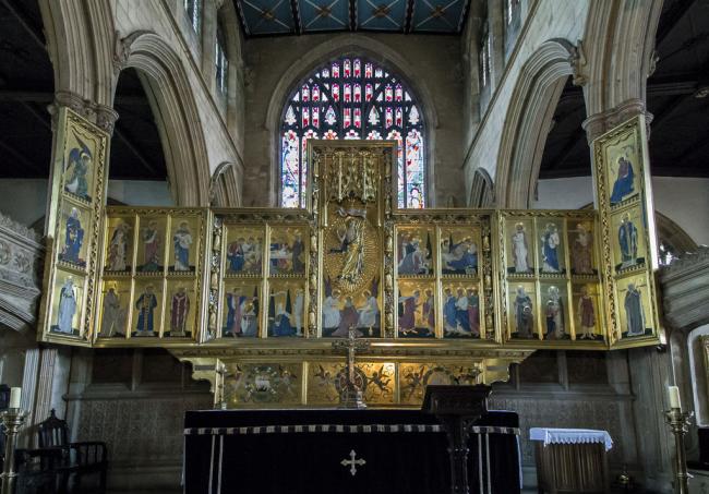 Gilded triptych reredos, designed by Ninian Comper, installed in 1937 inside Newark St Mary Magdalene