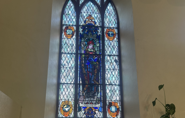 A stained glass window in a church