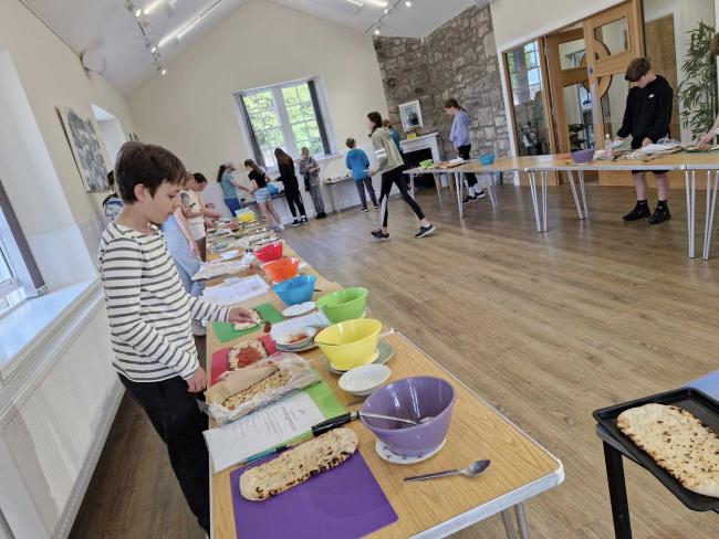 A cooking class inside a church