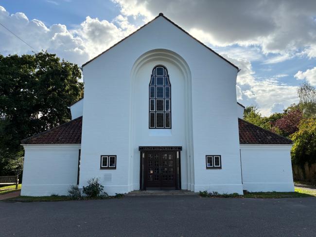 A brightly painted white church