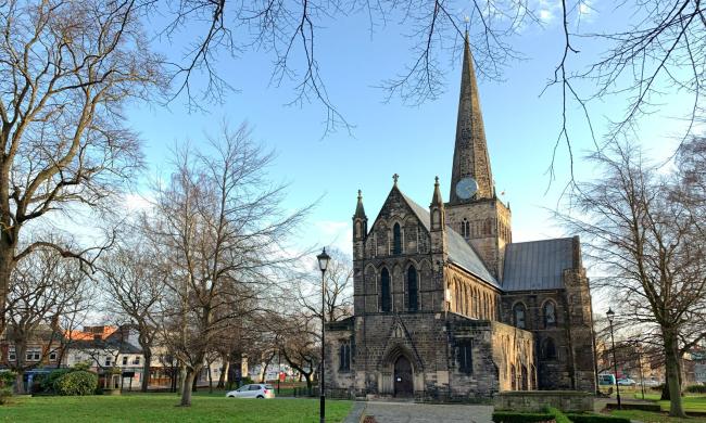 The stone exterior of the grand gothic St Cuthbert in Darlington